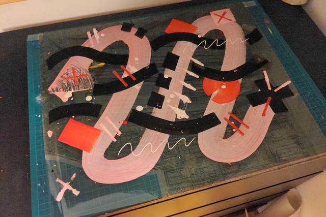 An abstract painting that looks a bit like a snake.