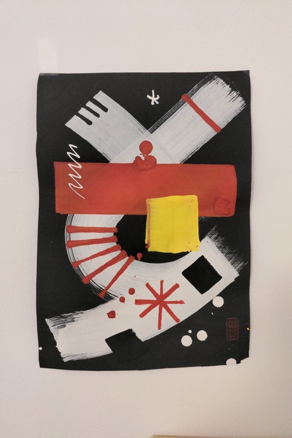 An abstract painting in black, white, red and yellow.