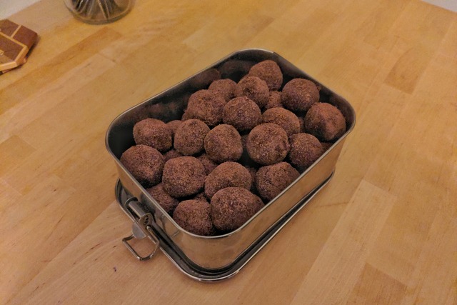 A metal box filled with energy balls.